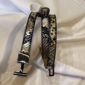 The Limited Snakeskin pattern adjustable belt medium.NWOT